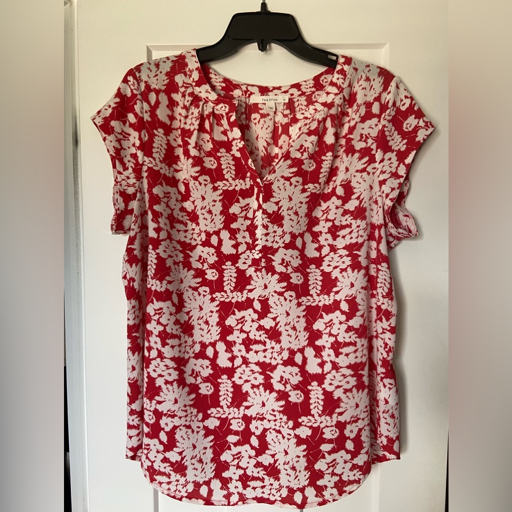 Red floral women’s top.